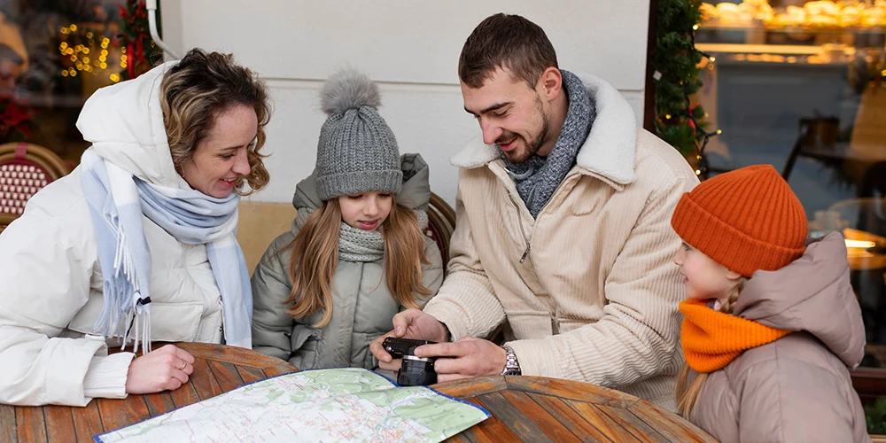 Family Trip Looking at Camera and map Indoor activities - family trip