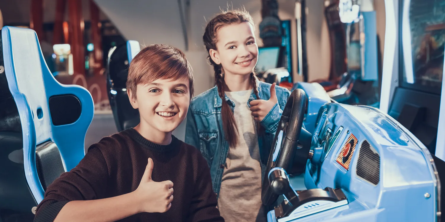 Kids show Thumbs Up in GamePlaza